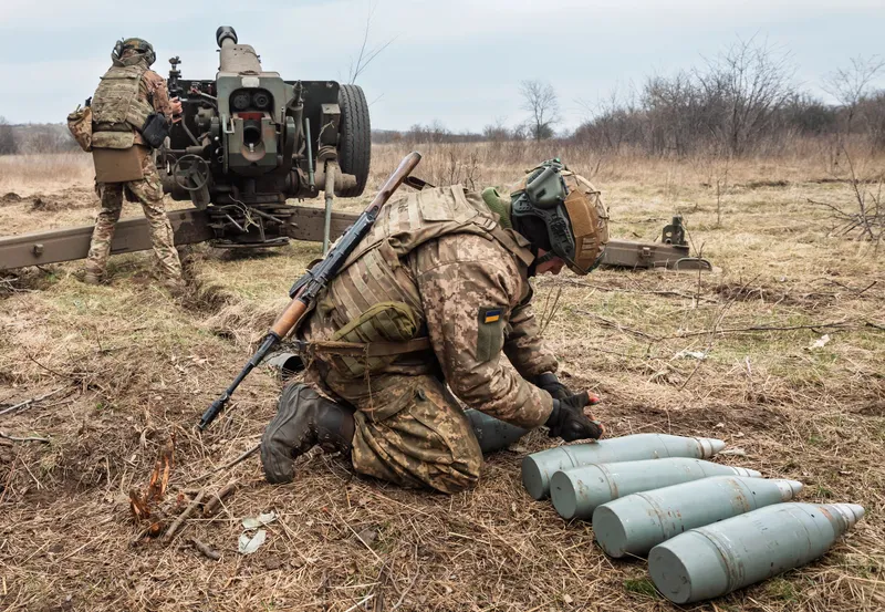Військовий на полі бою