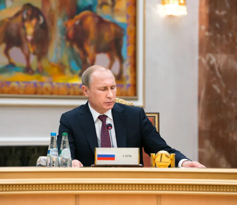 путін